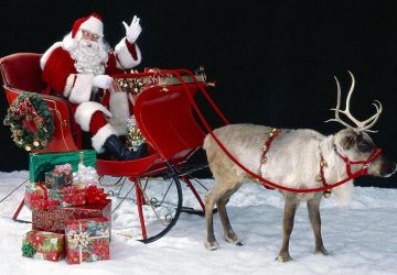 Santa On His Sleigh With Reindeer